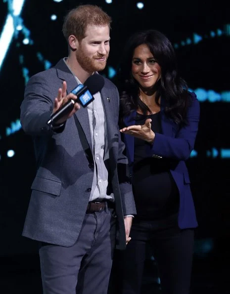 The Duchess of Sussex, Meghan Markle wore a new navy cashmere jacket by Ralph Lauren