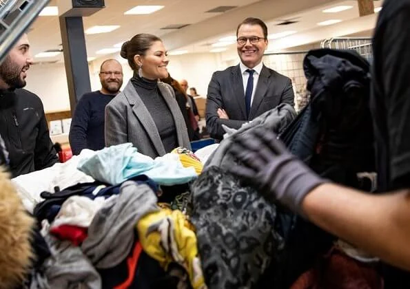 Crown Princess Victoria wore Erdem X H and M wool suit, Kreuger Jewellery summer feather earrings, Valentino shoulder bag. City Mission