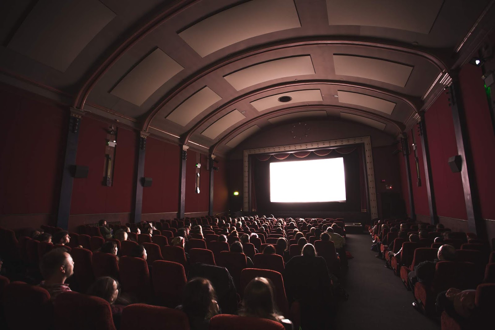 Movie Theater GIF  Movie Theater Sneaking Out  Discover  Share GIFs