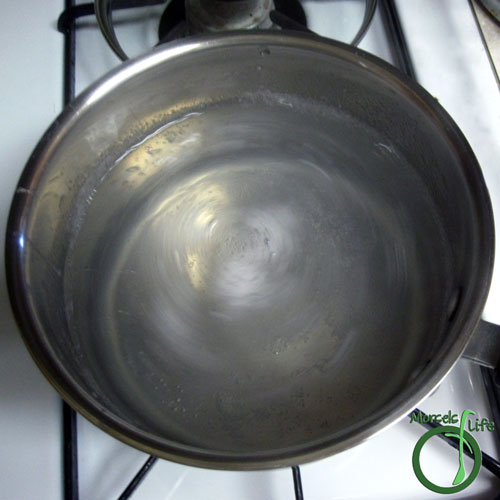 Morsels of Life - How to Poach an Egg Step 3 - Bring water to a simmer and quickly stir the water in one direction.