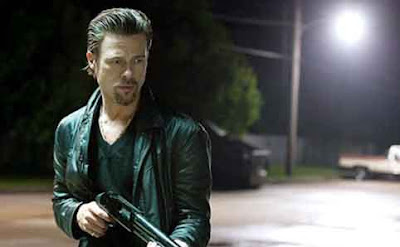 Brad Pitt as Jackie Cogan, fires his gun,, Killing Them Softly, Directed by Andrew Dominik