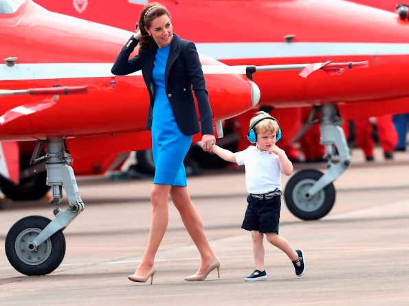 Prince William, Kate Middleton and Prince George visit the Royal International Air Tattoo at RAF Fairford. Kate wore Stella McCartney dress