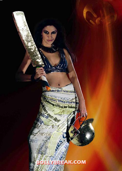 Mandira bedi in a sari with cricket bat and helmet - (2) -  Mandira Bedi unique Photo shoot