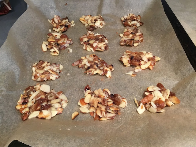 almond cookies on a cookie sheet