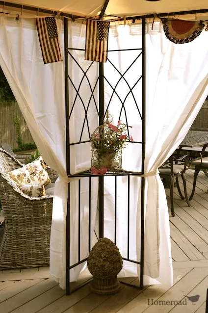 gazebo with flowing white curtains