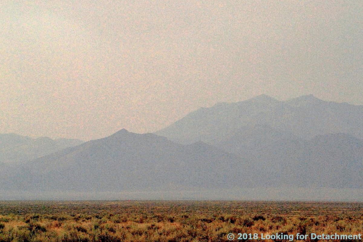 Looking For Detachment Roberts Mountains Viewed with and without Smoke
