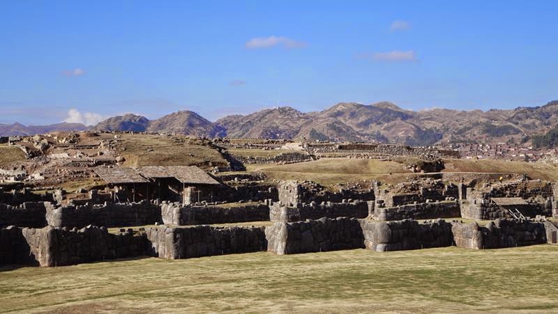 Sacsayhuamán also known as Saksaq Waman, is a walled complex located on the northern slopes of the city of Cusco. It is often described as a fortress since it is enclosed by three slopes and has a series of parallel walls that zigzag and would expose the flanks of invaders.