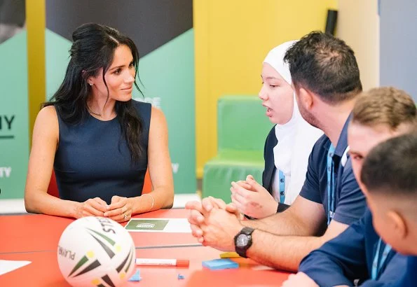 Meghan Markle wore Roksanda Athena pleated two-tone crepe midi dress