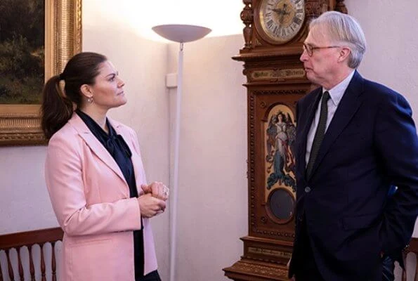 Stockholm Resilience Centre's science director and co-founder Carl Folke. Crown Princess Victoria wore Lexington Company pink blazer
