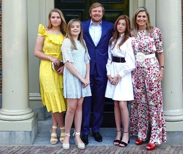 Queen Maxima wore a floral print silk jumpsuit by Seren. Princess Amalia wore a new cotton midi dress by Lisa Marie Fernandez