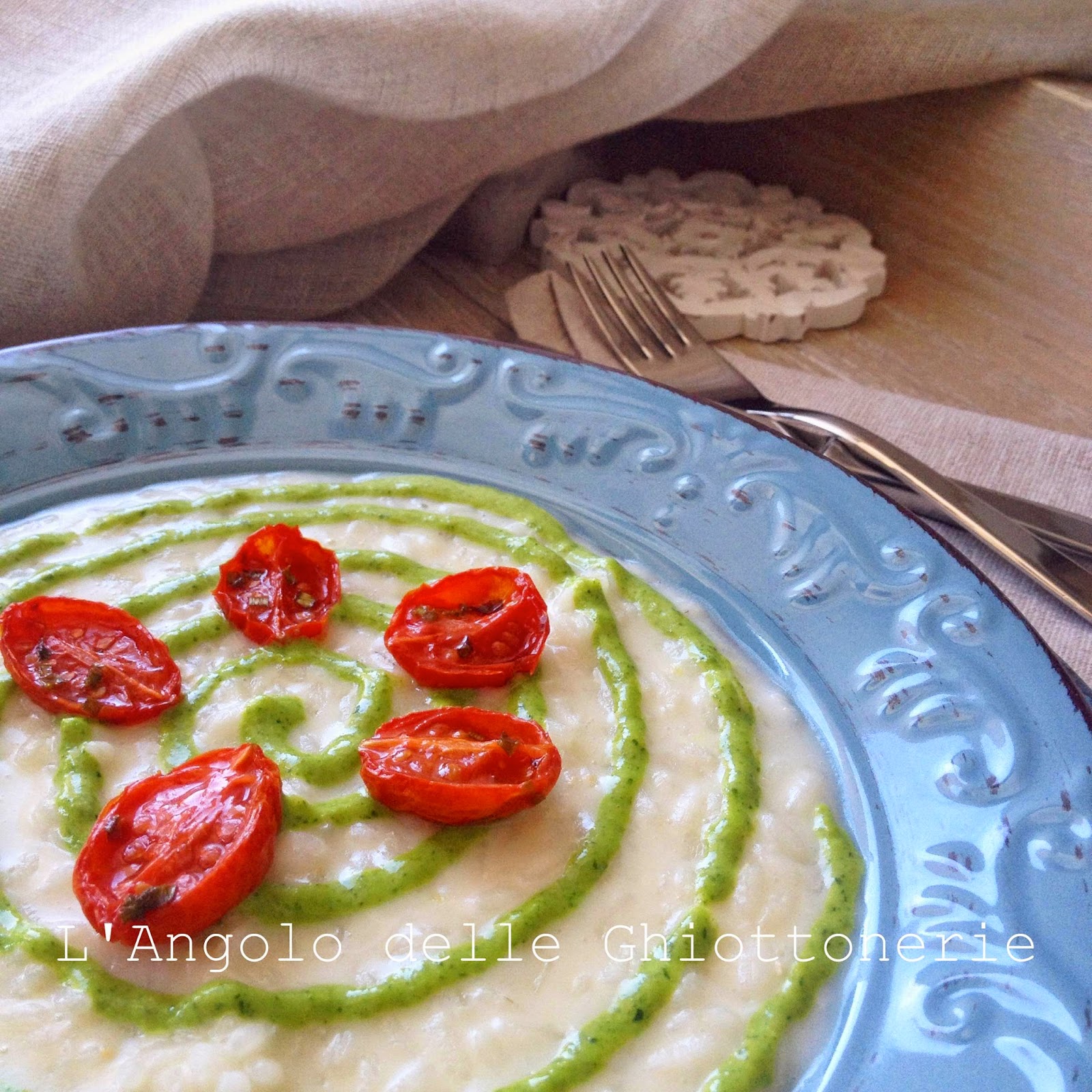 una domenica italiana. e' il mio risotto allo squaquerone di romagna dop, con pesto di rucola e pomodorini confit