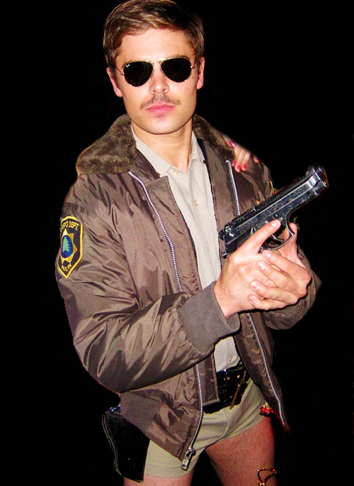 MEN'S JOURNAL AND HUNK'S Zac Efron Wear a Reno 911 Police Outfit On Halloween