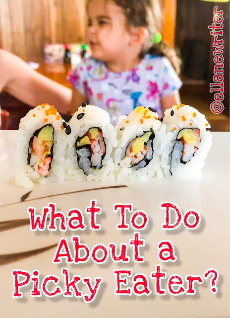 Sushi with a young girl in the background