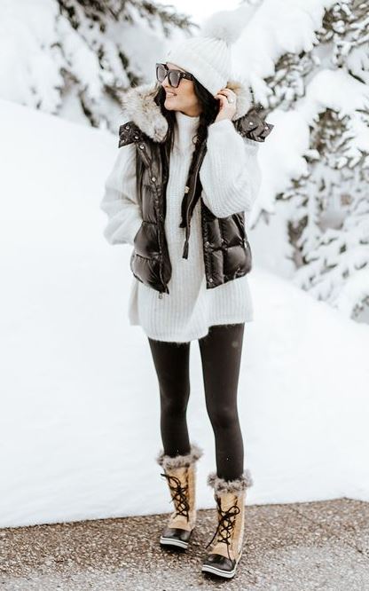 warm outfit idea for this winter / hat + black vest + white sweater + skinnies + boots