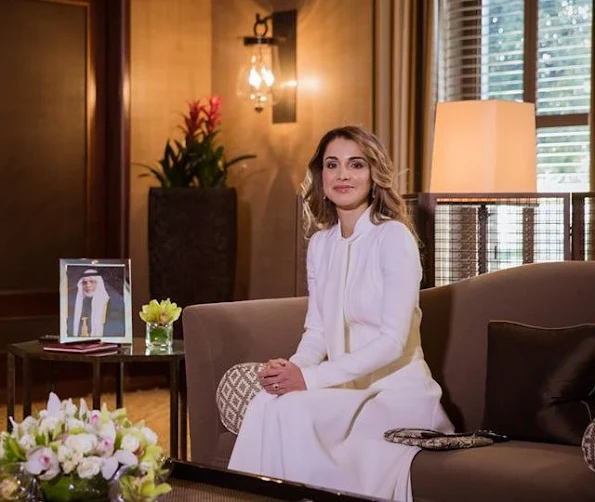 Queen Rania meets,  First Lady Agata Kornhauser style wore gianvito rossi shoes, Prada dress, diamond earrings, J.Crew closet