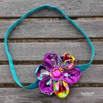 http://www.doodlecraftblog.com/2015/05/candy-wrapper-skittles-flower-headband.html