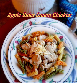 Apple Cider Cream Chicken, a flavorful, easy, hearty dinner. Sliced chicken cooked in a creamy sauce made with apple cider, then tossed in tricolor rotini. | Recipe developed by www.BakingInATornado.com | #recipe #dinner