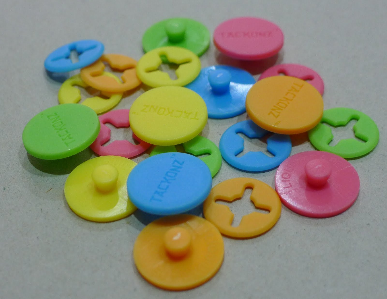 Ccube Sports HUB: TackOnz - The Adhesive Race Bib Button