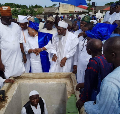 b Photos from the burial of Musiliu Obanikoro's mother