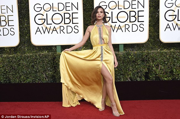 Emily Ratajkowski Braless wears jaw-dropping slinky yellow dress at