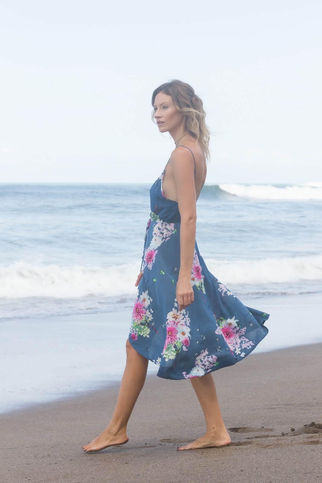 fashion blogger and designer Alison Hutchinson, iswearing a KAYVALYA Jade Dress in Blue Floral