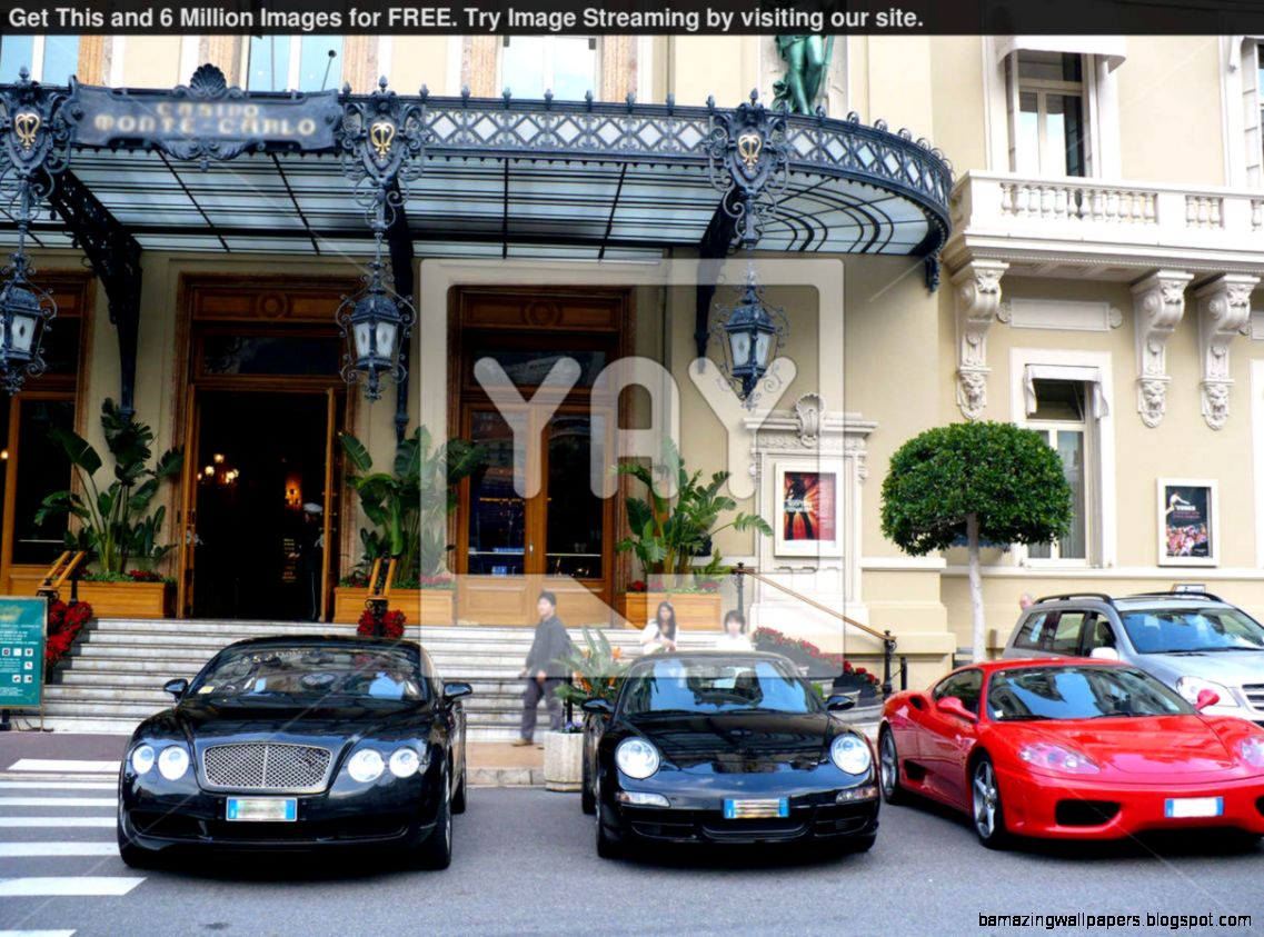 Royalty Free Image of Monte Carlo Casino With Luxurious Cars