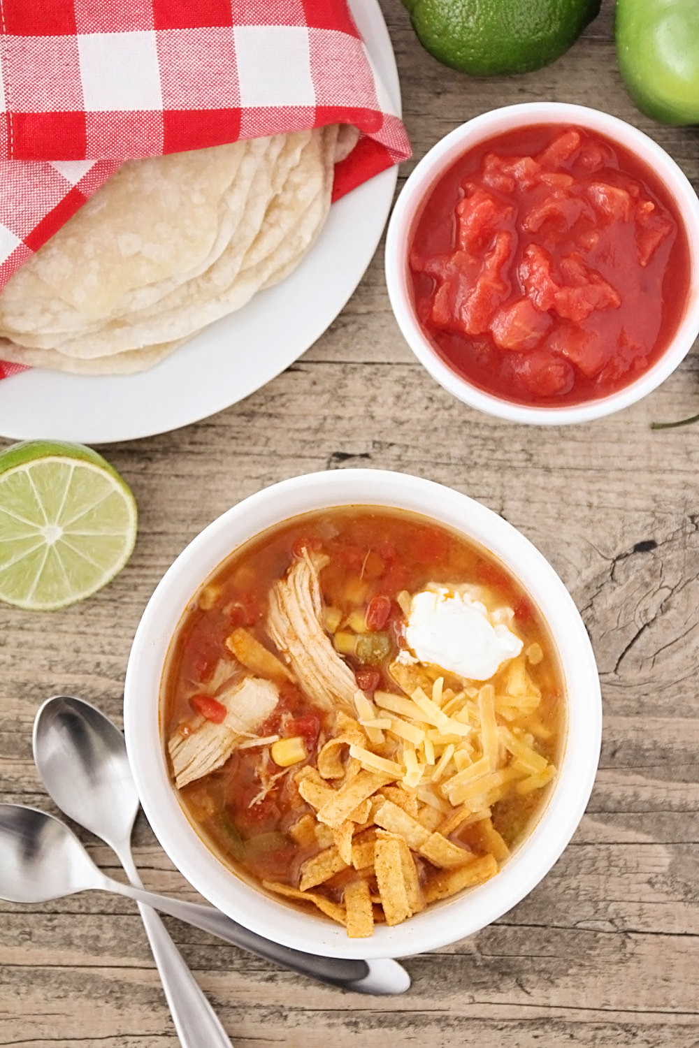 This Instant Pot chicken tortilla soup is incredibly flavorful, and has just a thirty minute cook time! A savory and delicious dinner that's perfect for a busy night. 