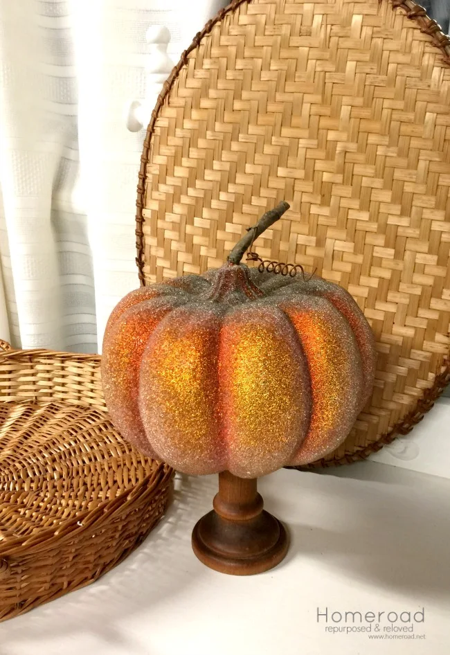 pumpkin on stand with basket