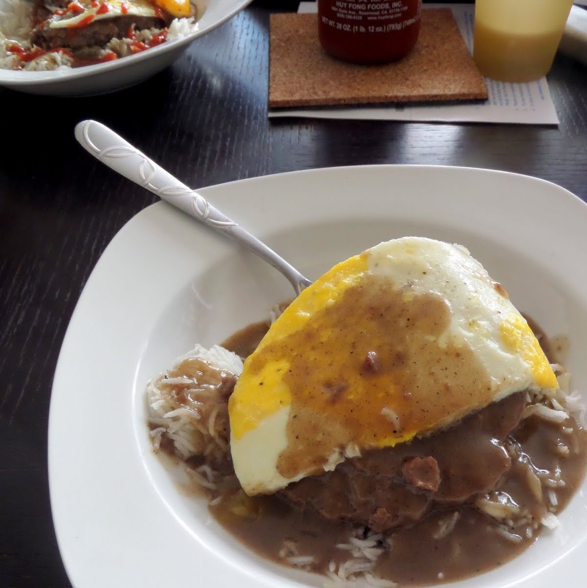 Loco Moco:  White rice smothered in brown gravy and a beef patty topped with a fried egg.  The Hawaiian breakfast of champions.