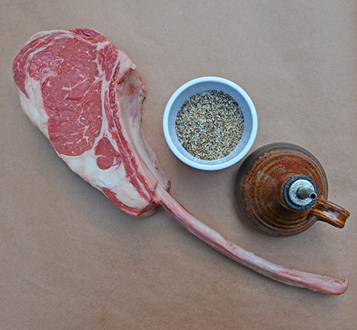 Reverse Seared Thick Certified Angus Beef Brand Tomahawk Ribeye Steak Recipe for the kamado grill.