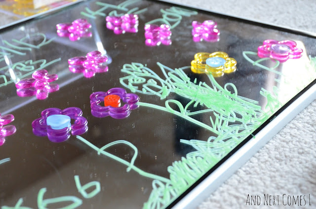 Close up of spring drawings and mirror play for kids