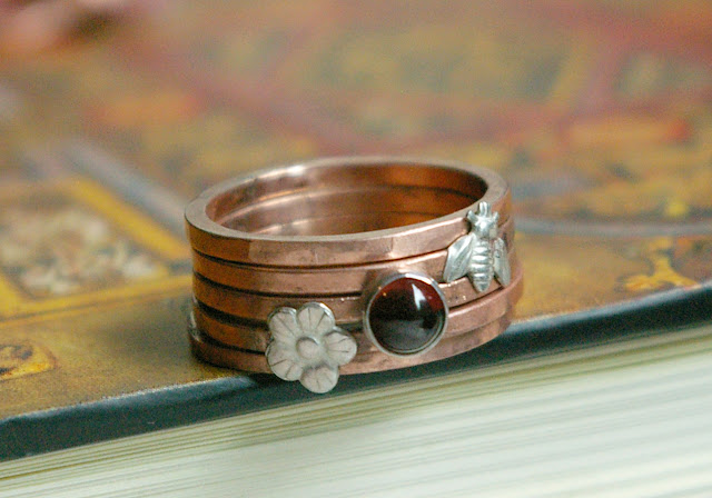 https://www.etsy.com/ca/listing/596915499/five-copper-stacking-rings-size-8-garnet