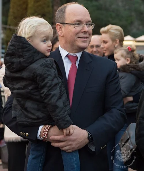 Princess Charlene, Princess Gabriella at Monaco Christmas Village in Monaco. Princess Charlene wears MICHAEL KORS Double breasted wool crepe blazer