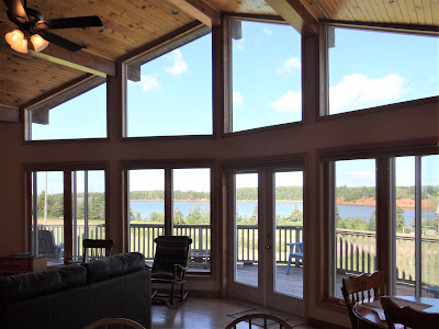 Floor to ceiling windows provide spectacular seaside view