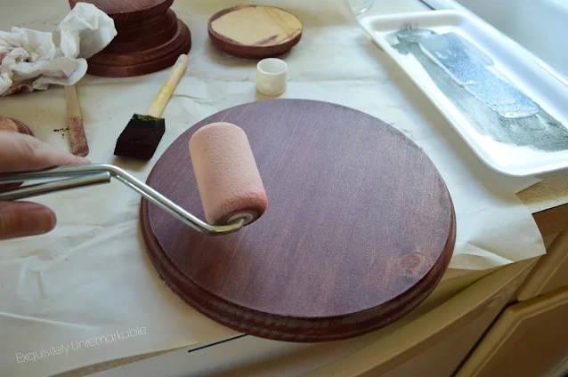 Rolling Brown Paint Onto Craft Rounds