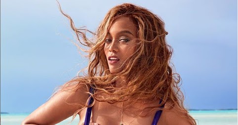Tyra Banks grabs her boobs as she shares more racy photos from her