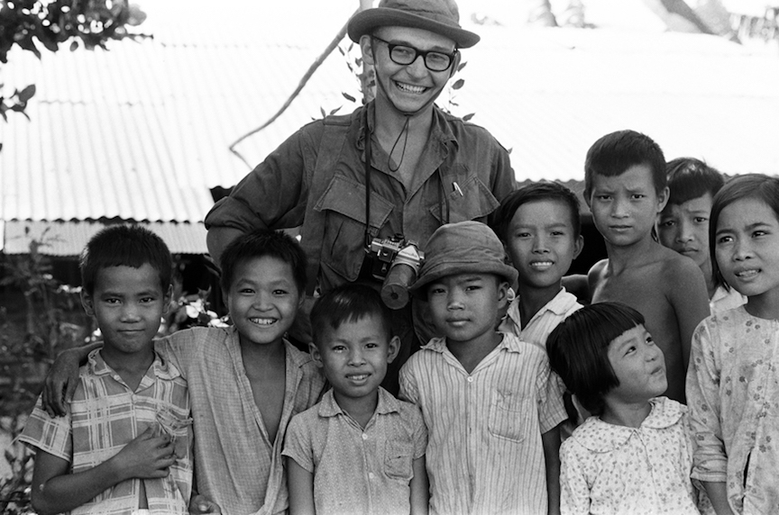 Charlie Haughey poses with Vietnamese school children. Charlie Haughey poses with Vietnamese school children.