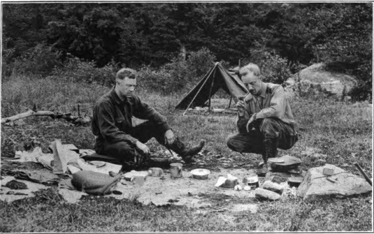 Arthur O. Friel and companion at their camp