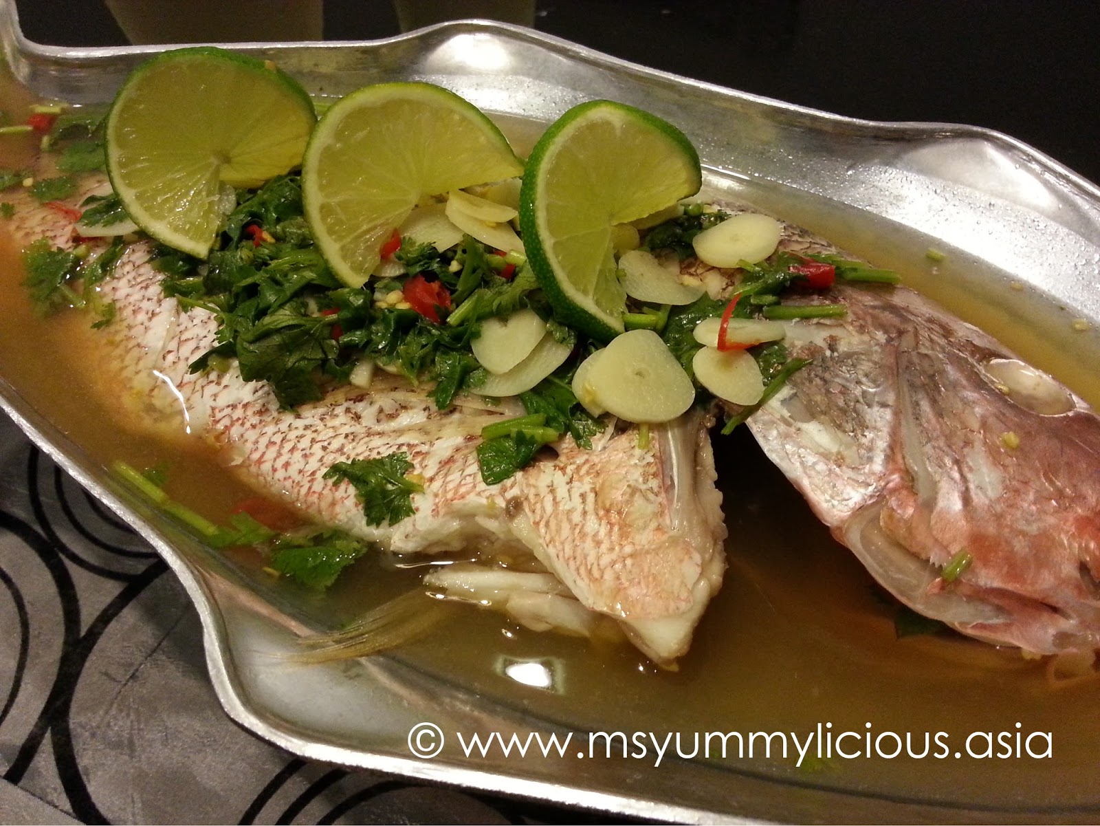 Steamed Fish with Thai Lime Dressing (Pla Neung Manao ปลากะพงนึ่งมะนาว