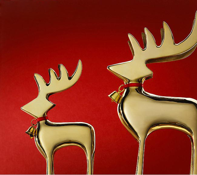 close_up_of_gold_reindeer_with_bells_