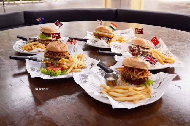 All five burgers, including our local legendary the Percik Burger on the table