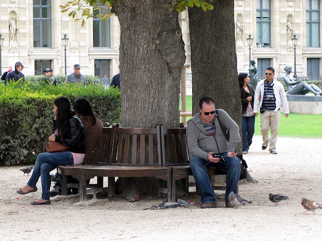 Busy bench around a tree, Tuileries Garden, Paris
