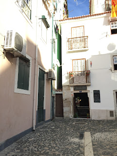 It's said that when police raided brothels in this neighborhood, prostitutes would escape through this narrow door too small for police on horseback to chase after them