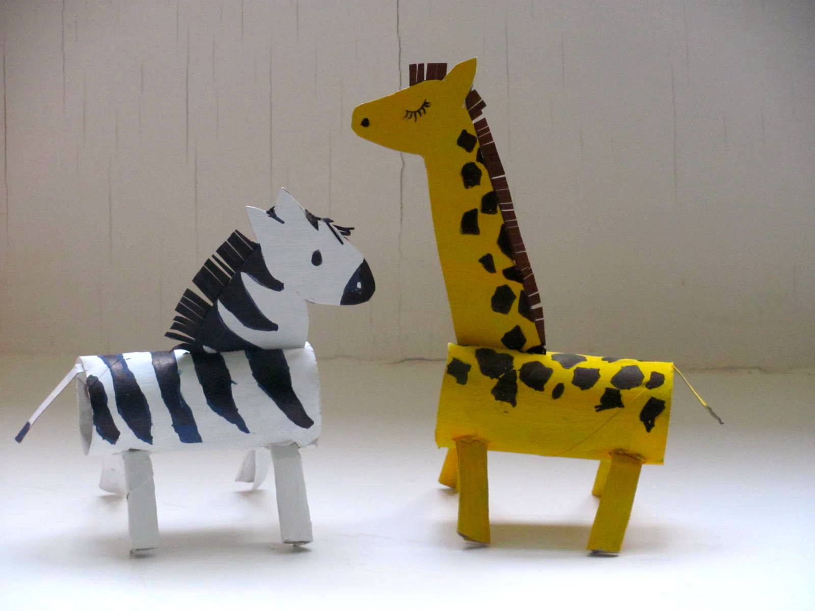 Jumble Tree A giraffe and a zebra roll up to the Zoo