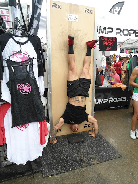 Image of an athlete performing hand stand pushups at the 2012 CrossFit Games