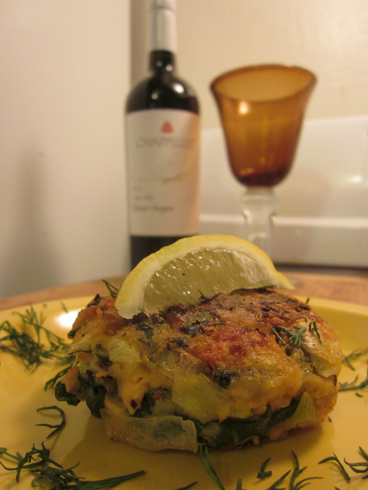 SalmonArtichoke Cakes with Caramelized Leeks and Kale