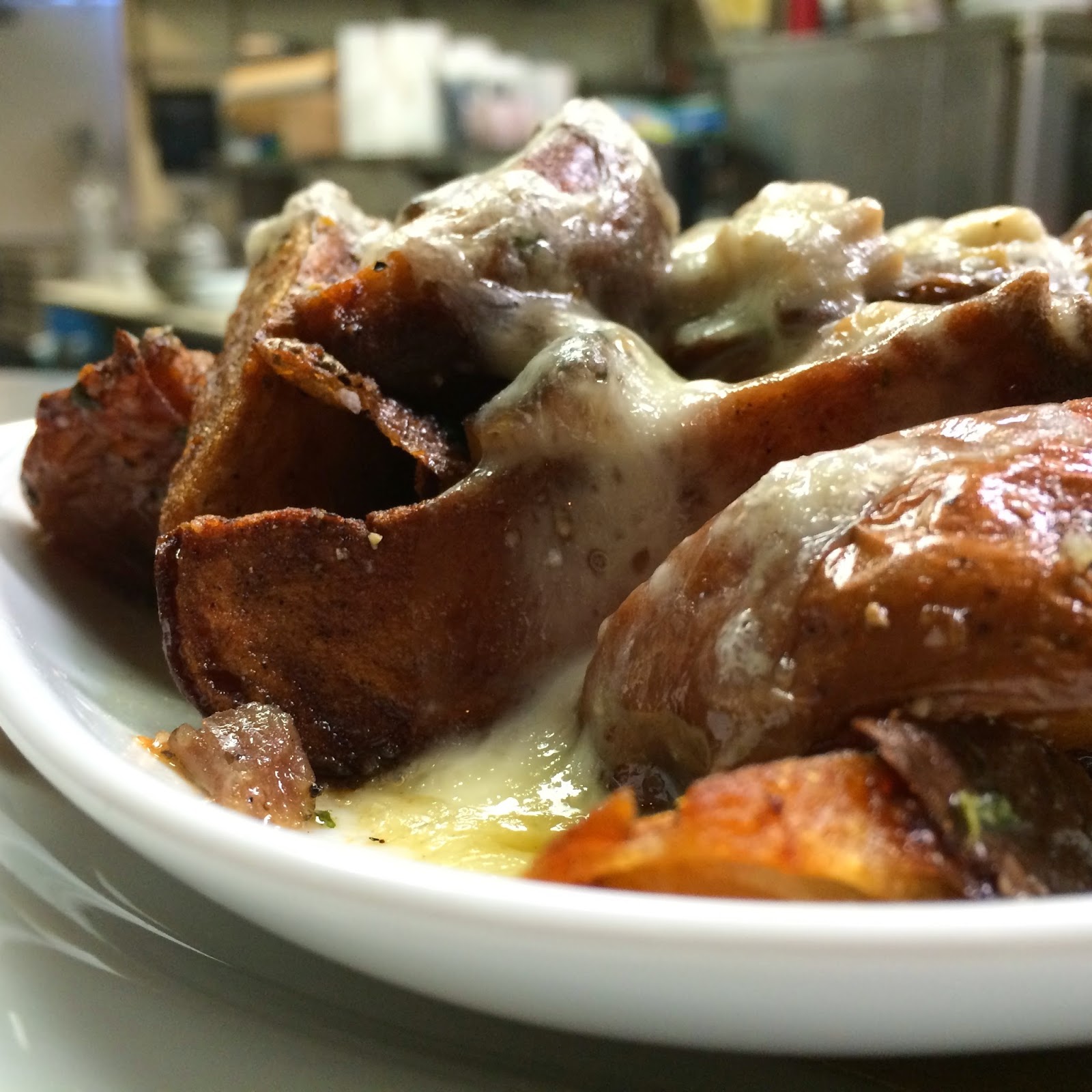 PCP Home Fries: Pork Cheek Pastrami, Garlic, Smoked Meat Gravy, and Melted Swiss.