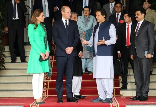 Kate Middleton wore a blue Kurta and trousers by Pakistani designer Maheen Khan and the Zeen earrings. Catherine Walker tunic