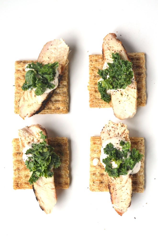 Kale Chicken Caesar Bites are a simple appetizer that only require 4 ingredients! They are flavorful and easy to make! www.nutritionistreviews.com