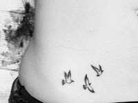 Three Little Birds Tattoo Behind Ear